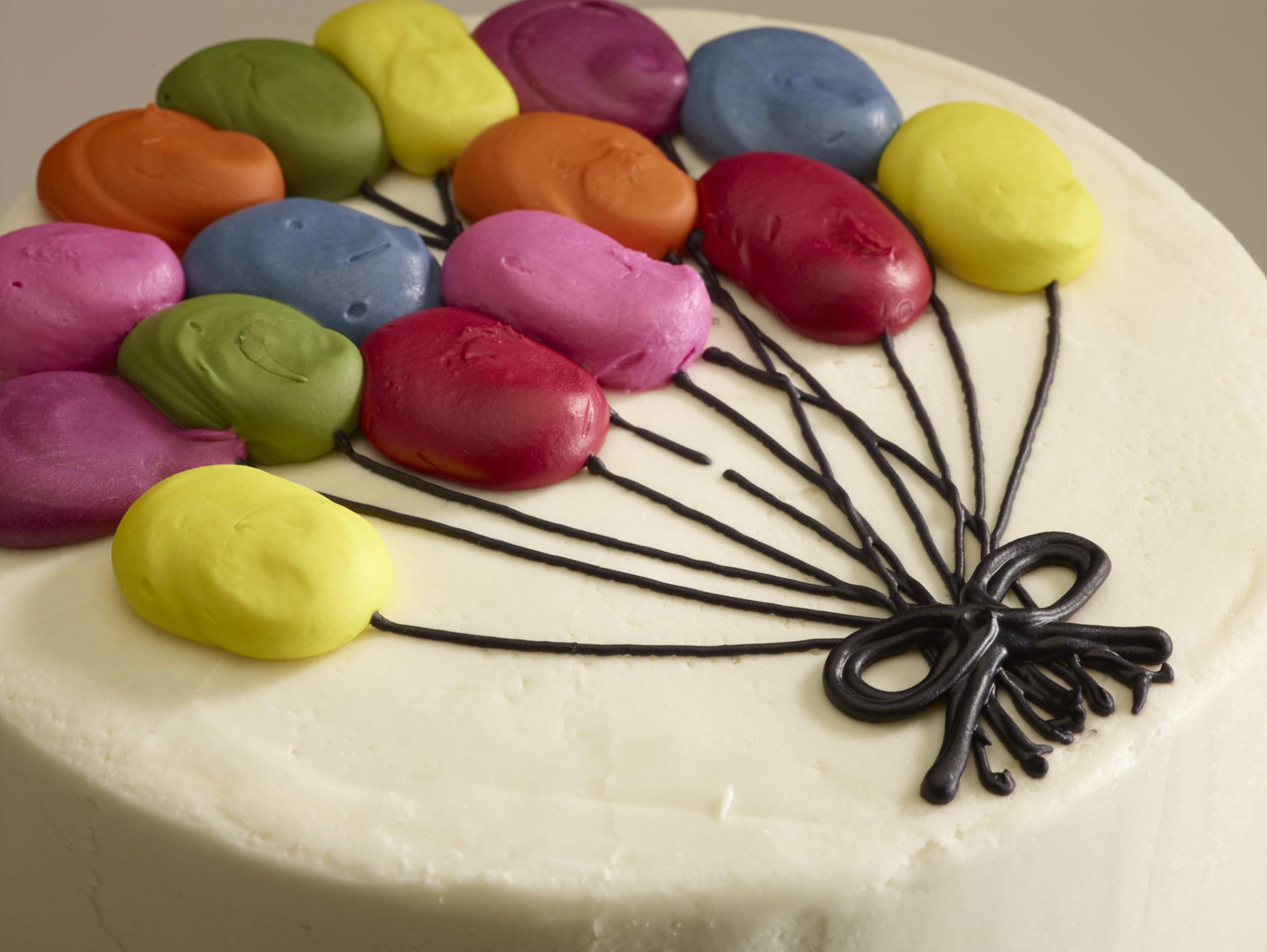 cake with balloon decorations