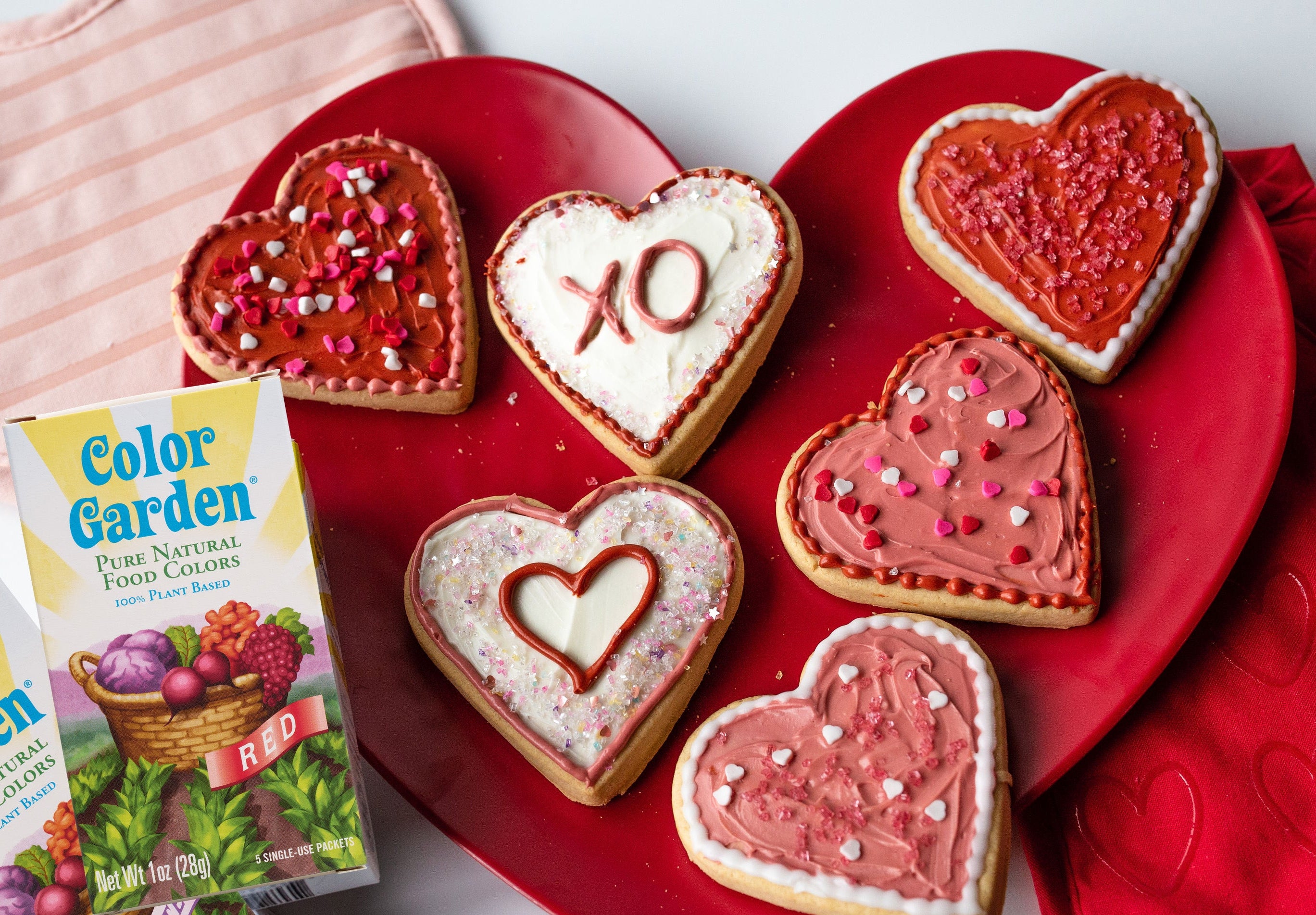 plate of cookies with box of color garden red and color garden pastels food colors